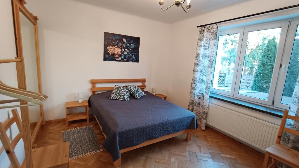 Bedroom with art and lamps